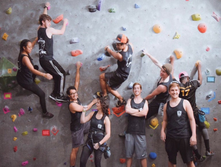 Students climbing Rock Wall at CRW